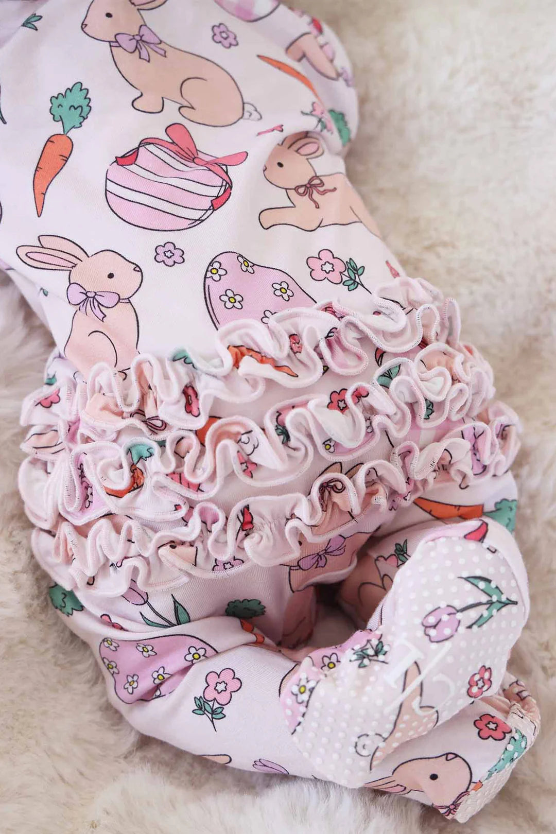 Hoppy Spring Ruffle Zipper Footie | Pink
